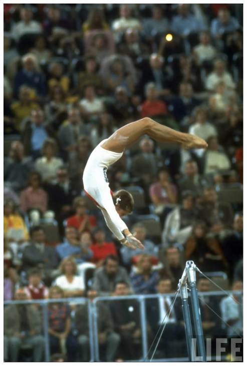soviet-gymnast-olga-korbut-in-action-on-the-uneven-bars-at-the-summer-olympics-1972